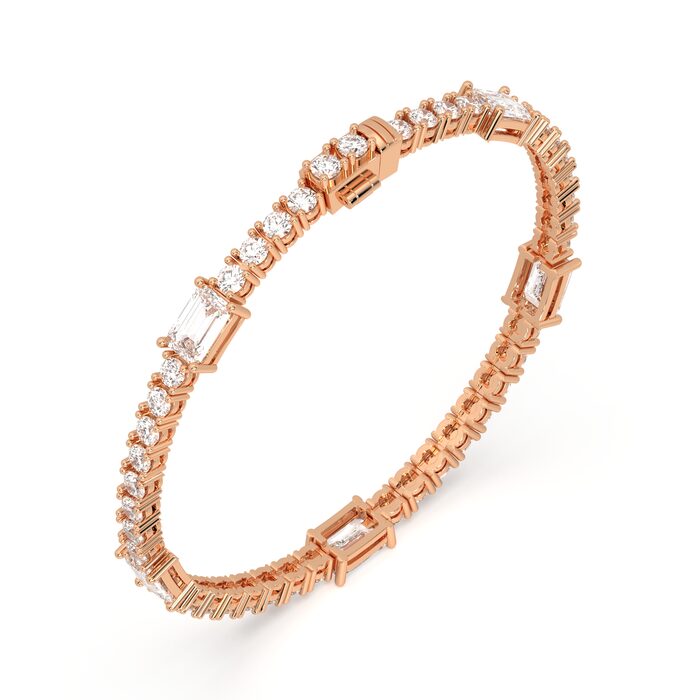 Round tennis bracelet with emerald cut accents, approx. 9.62ct lab-grown diamonds in 14k gold