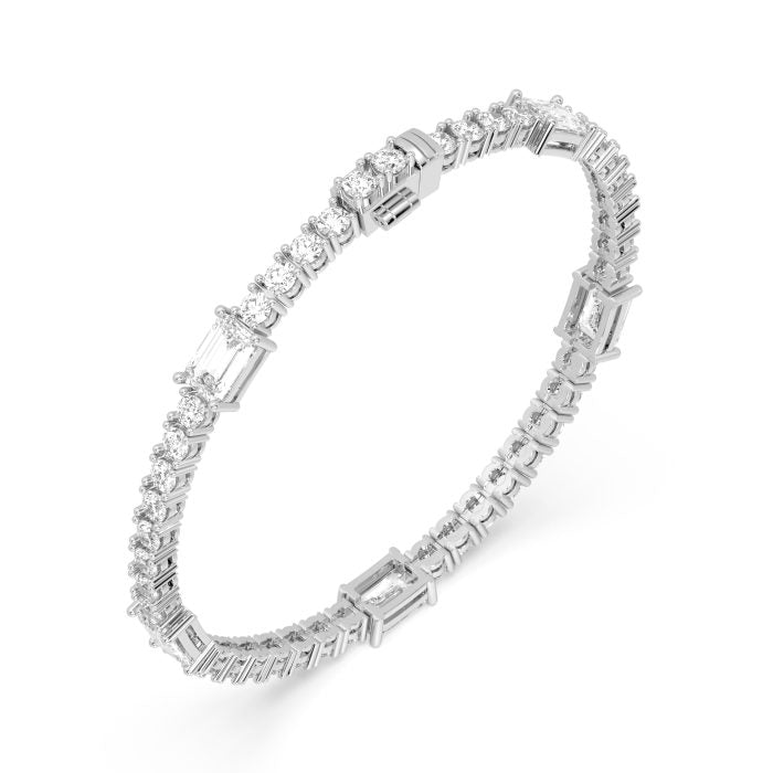 Round tennis bracelet with emerald cut accents, approx. 9.62ct lab-grown diamonds in 14k gold