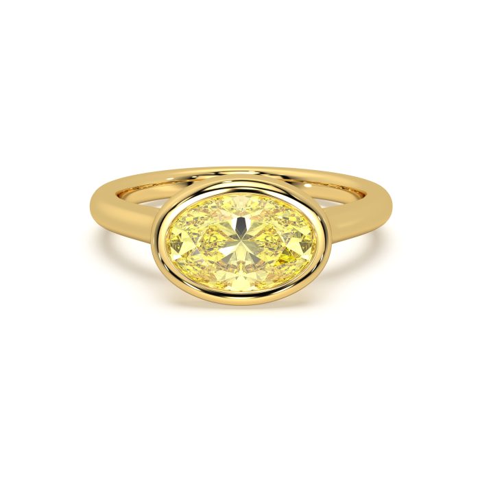 Yellow oval east-west bezel ring with a 1.75ct lab-grown diamond in 14k yellow gold